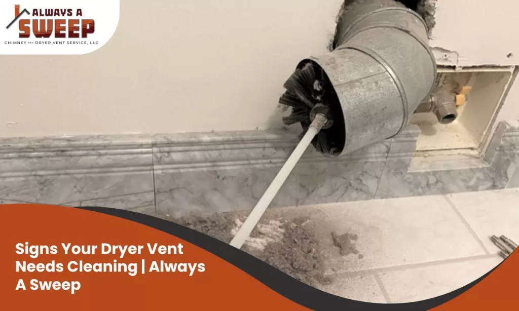 A flexible rod and rotary brush cleaning tool clearing lint out of a metal dryer exhaust vent during a professional service in Denver, CO.