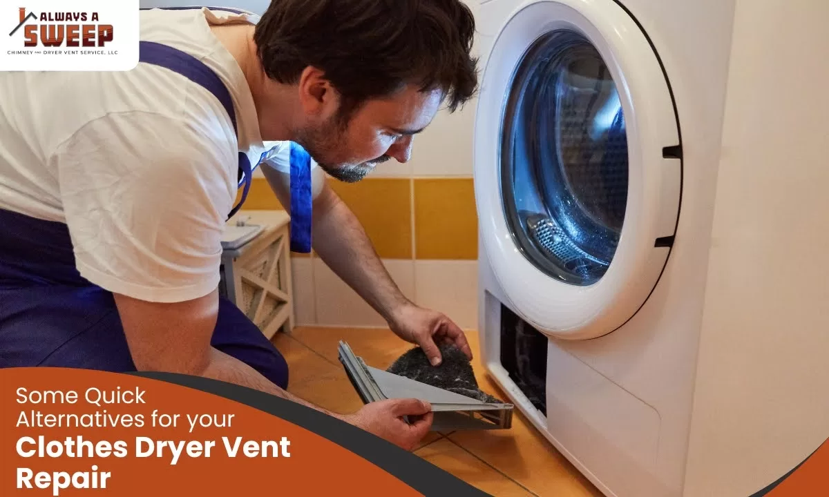 A professional appliance service technician inspecting and removing heavy lint from the lower access panel filter of a white front-load washing machine and dryer unit during a clothes dryer vent repair service in Ocala, FL.