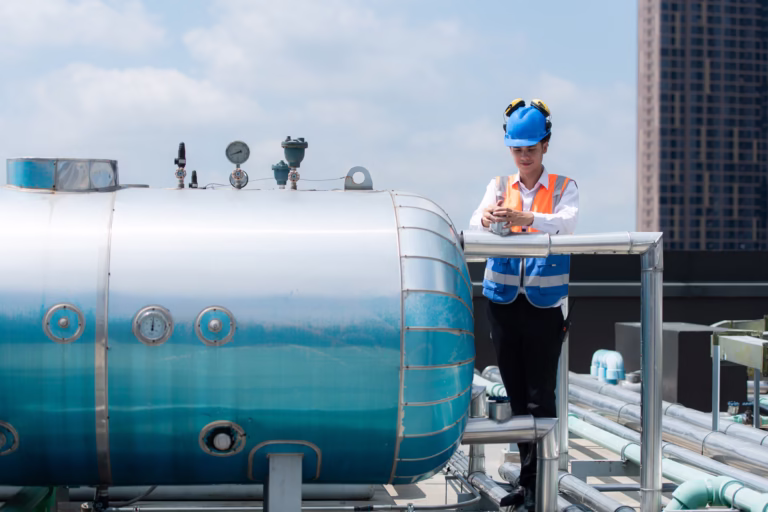 Engineers inspect the completed air conditioning and water syste
