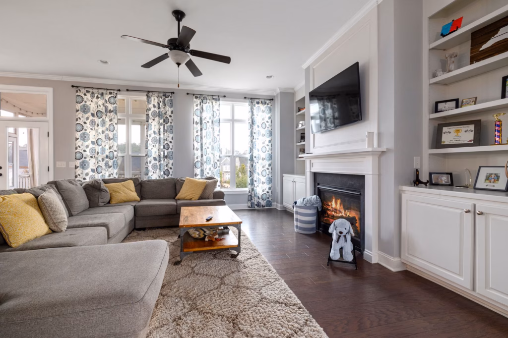 technician performing indoor gas fireplace installation in a Central Florida living room