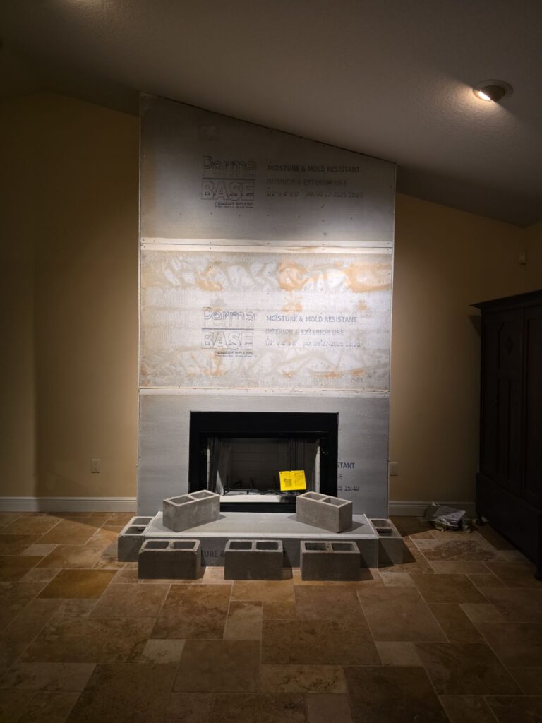 built-in electric fireplace insert during installation in a Central Florida home