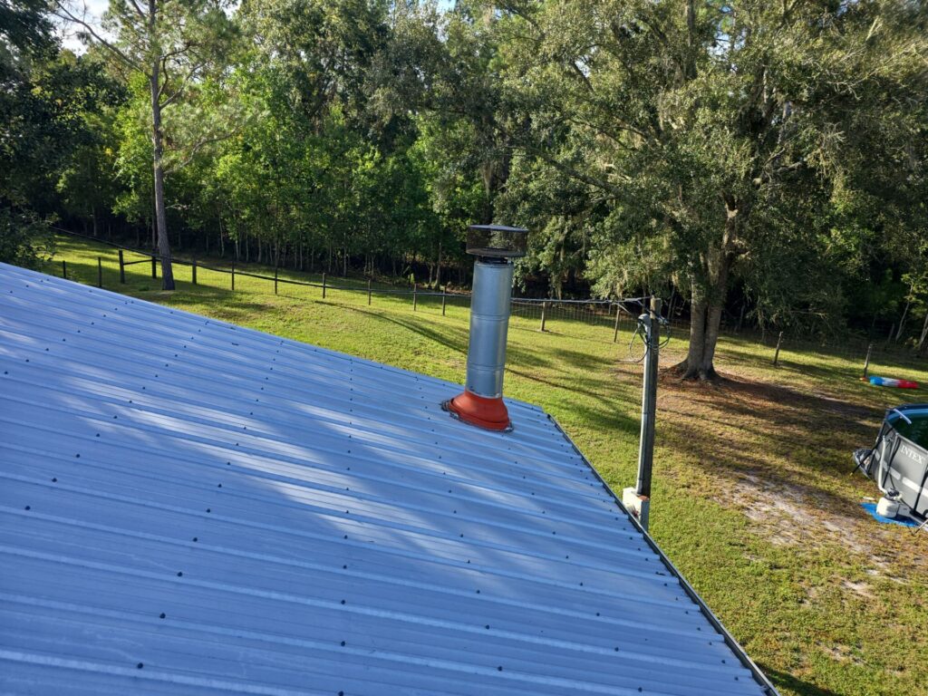 certified technician inspecting a chimney flue in Ocala FL home
