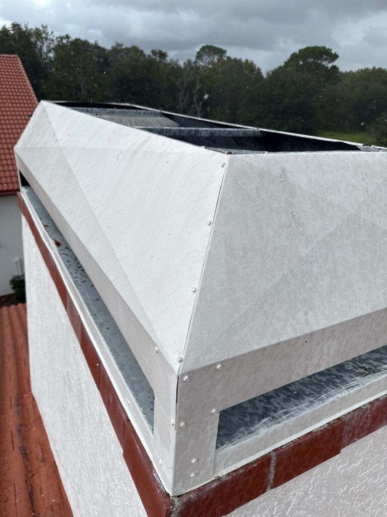 HEPA vacuum and tarped floor setup during chimney cleaning near me service